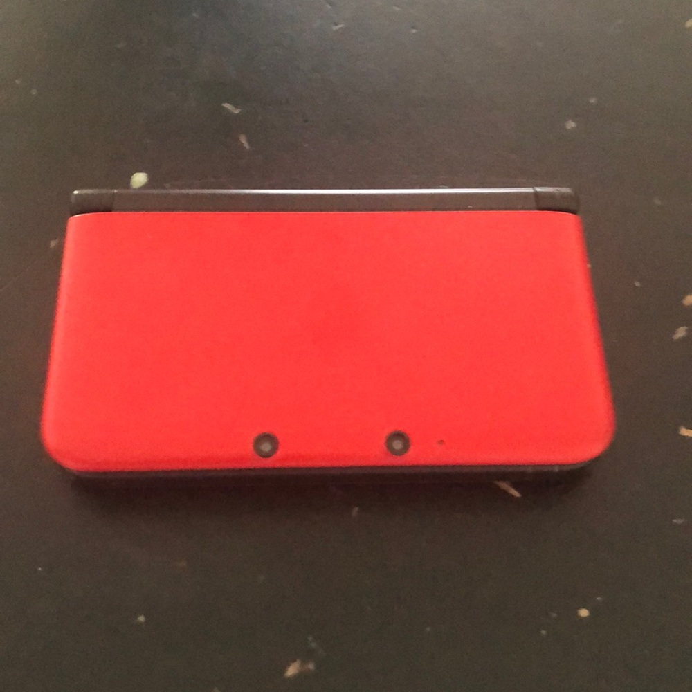 Nintendo 3DS XL with two games